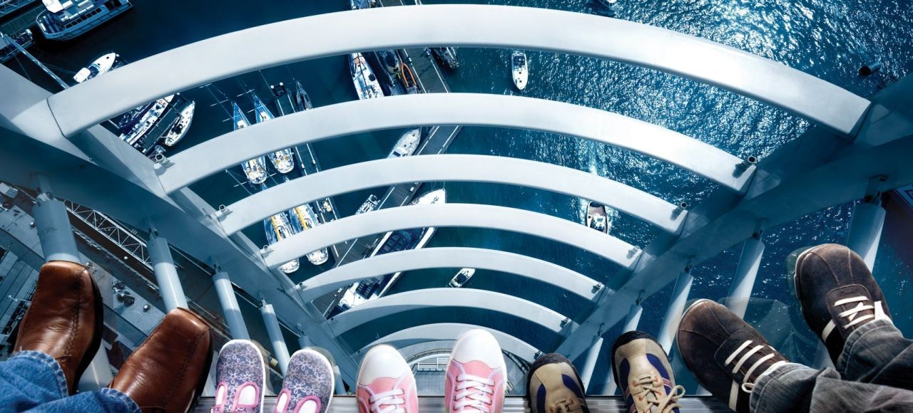 Emirates Spinnaker Tower Sky Walk - people's feet on the glass floor
